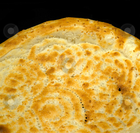 To use this stock image in your creative project, please select the size you need over to the right and click the "Add to Cart" button.
Your downloaded image will come with the Cutcaster watermark removed so don’t worry about the watermark you see on this page. Uzbek bread stock photo, Original fresh uzbek bread isolated over black background by Francesco Perre