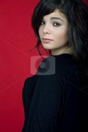 To use this stock image in your creative project, please select the size you need over to the right and click the "Add to Cart" button.
Your downloaded image will come with the Cutcaster watermark removed so don’t worry about the watermark you see on this page. Woman stock photo, Young woman portrait isolated on red background by Rui Vale de Sousa