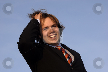 To use this stock image in your creative project, please select the size you need over to the right and click the "Add to Cart" button.
Your downloaded image will come with the Cutcaster watermark removed so don’t worry about the watermark you see on this page. Happy stock photo, Portrait of a young business man, on blue sky by Rui Vale de Sousa
