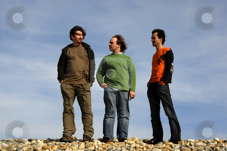 To use this stock image in your creative project, please select the size you need over to the right and click the "Add to Cart" button.
Your downloaded image will come with the Cutcaster watermark removed so don’t worry about the watermark you see on this page. Three stock photo, Three casual young men at the beach by Rui Vale de Sousa
