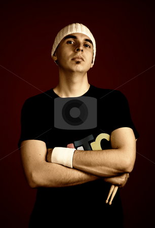 To use this stock image in your creative project, please select the size you need over to the right and click the "Add to Cart" button.
Your downloaded image will come with the Cutcaster watermark removed so don’t worry about the watermark you see on this page. Young man stock photo, Young serious man portrait with hat, studio picture by Rui Vale de Sousa