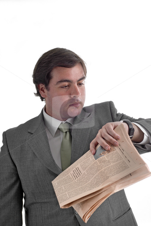 To use this stock image in your creative project, please select the size you need over to the right and click the "Add to Cart" button.
Your downloaded image will come with the Cutcaster watermark removed so don’t worry about the watermark you see on this page. Newspaper stock photo, Young businessman with a newspaper isolated on white by Rui Vale de Sousa