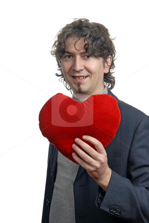 To use this stock image in your creative project, please select the size you need over to the right and click the "Add to Cart" button.
Your downloaded image will come with the Cutcaster watermark removed so don’t worry about the watermark you see on this page. Heart stock photo, Man holding a red heart in the hand. On white background by Rui Vale de Sousa