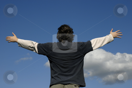 To use this stock image in your creative project, please select the size you need over to the right and click the "Add to Cart" button.
Your downloaded image will come with the Cutcaster watermark removed so don’t worry about the watermark you see on this page. Freedom stock photo, Man with open arms and the blue sky by Rui Vale de Sousa