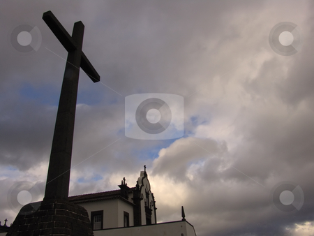 To use this stock image in your creative project, please select the size you need over to the right and click the "Add to Cart" button.
Your downloaded image will come with the Cutcaster watermark removed so don’t worry about the watermark you see on this page. Cross stock photo, Cross and church in azores island by Rui Vale de Sousa