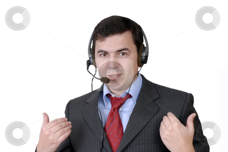 To use this stock image in your creative project, please select the size you need over to the right and click the "Add to Cart" button.
Your downloaded image will come with the Cutcaster watermark removed so don’t worry about the watermark you see on this page. Call stock photo, Young call center man talking by the phone by Rui Vale de Sousa