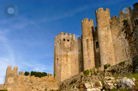 To use this stock image in your creative project, please select the size you need over to the right and click the "Add to Cart" button.
Your downloaded image will come with the Cutcaster watermark removed so don’t worry about the watermark you see on this page. Castle stock photo, Obidos Castle detail in Perspective. Obidos, Portugal. by Rui Vale de Sousa