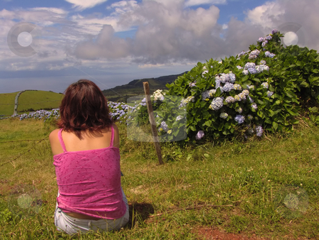 To use this stock image in your creative project, please select the size you need over to the right and click the "Add to Cart" button.
Your downloaded image will come with the Cutcaster watermark removed so don’t worry about the watermark you see on this page. Peaceful stock photo, Girl in azores landscape by Rui Vale de Sousa