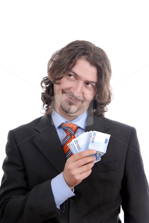 To use this stock image in your creative project, please select the size you need over to the right and click the "Add to Cart" button.
Your downloaded image will come with the Cutcaster watermark removed so don’t worry about the watermark you see on this page. Money stock photo, Business man holding money isolated on white by Rui Vale de Sousa