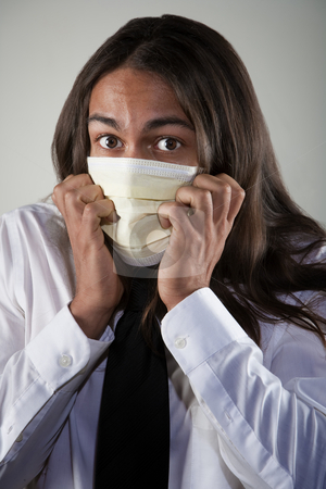 To use this stock image in your creative project, please select the size you need over to the right and click the "Add to Cart" button.
Your downloaded image will come with the Cutcaster watermark removed so don’t worry about the watermark you see on this page. Man wearing a breathing mask stock photo, Handsome young man with long hair wearing a breathing mask for protection from germs and viruses by Scott Griessel