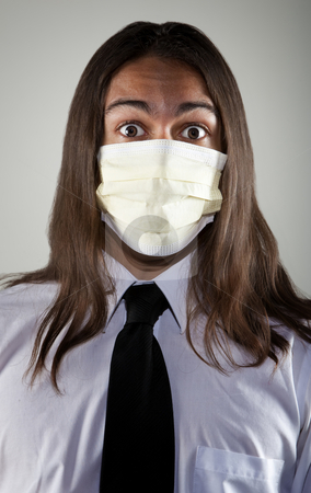 To use this stock image in your creative project, please select the size you need over to the right and click the "Add to Cart" button.
Your downloaded image will come with the Cutcaster watermark removed so don’t worry about the watermark you see on this page. Man wearing a breathing mask stock photo, Handsome young man with long hair wearing a breathing mask for protection from germs and viruses by Scott Griessel