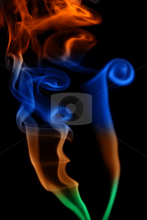 To use this stock image in your creative project, please select the size you need over to the right and click the "Add to Cart" button.
Your downloaded image will come with the Cutcaster watermark removed so don’t worry about the watermark you see on this page. Smoke stock photo, Abstract colored smoke in a black background by Rui Vale de Sousa