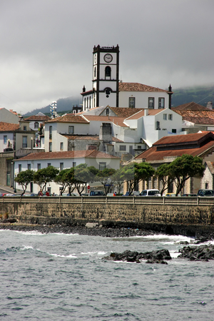 To use this stock image in your creative project, please select the size you need over to the right and click the "Add to Cart" button.
Your downloaded image will come with the Cutcaster watermark removed so don’t worry about the watermark you see on this page. Village stock photo, View from a boat of a village of azores by Rui Vale de Sousa