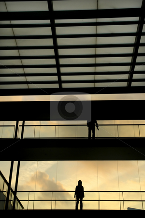 To use this stock image in your creative project, please select the size you need over to the right and click the "Add to Cart" button.
Your downloaded image will come with the Cutcaster watermark removed so don’t worry about the watermark you see on this page. Modern stock photo, People in the modern buildind at sunset by Rui Vale de Sousa