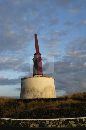 To use this stock image in your creative project, please select the size you need over to the right and click the "Add to Cart" button.
Your downloaded image will come with the Cutcaster watermark removed so don’t worry about the watermark you see on this page. Wondmill stock photo, Azores windmill of s. jorge by Rui Vale de Sousa