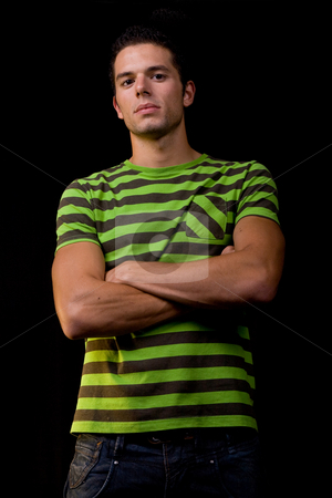 To use this stock image in your creative project, please select the size you need over to the right and click the "Add to Cart" button.
Your downloaded image will come with the Cutcaster watermark removed so don’t worry about the watermark you see on this page. Young man stock photo, Young man portrait, on a black background by Rui Vale de Sousa