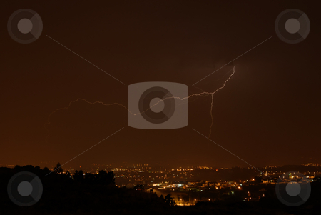 To use this stock image in your creative project, please select the size you need over to the right and click the "Add to Cart" button.
Your downloaded image will come with the Cutcaster watermark removed so don’t worry about the watermark you see on this page. Lightning stock photo, Thunder at night over a city in portugal by Rui Vale de Sousa