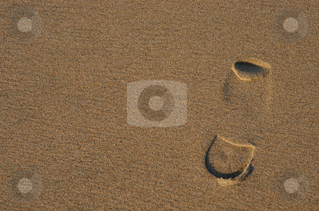 To use this stock image in your creative project, please select the size you need over to the right and click the "Add to Cart" button.
Your downloaded image will come with the Cutcaster watermark removed so don’t worry about the watermark you see on this page. Footprints stock photo, Footprints on the sand by Rui Vale de Sousa