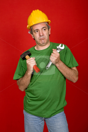 To use this stock image in your creative project, please select the size you need over to the right and click the "Add to Cart" button.
Your downloaded image will come with the Cutcaster watermark removed so don’t worry about the watermark you see on this page. Foreman stock photo, Mature casual foreman on a red background by Rui Vale de Sousa