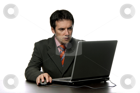 To use this stock image in your creative project, please select the size you need over to the right and click the "Add to Cart" button.
Your downloaded image will come with the Cutcaster watermark removed so don’t worry about the watermark you see on this page. Working stock photo, Young man working with his personal computer by Rui Vale de Sousa