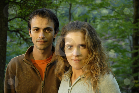 To use this stock image in your creative project, please select the size you need over to the right and click the "Add to Cart" button.
Your downloaded image will come with the Cutcaster watermark removed so don’t worry about the watermark you see on this page. Couple stock photo, Young fashion couple portrait at the forest by Rui Vale de Sousa