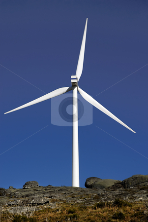 To use this stock image in your creative project, please select the size you need over to the right and click the "Add to Cart" button.
Your downloaded image will come with the Cutcaster watermark removed so don’t worry about the watermark you see on this page. Windmill stock photo, White wind turbine in the top of the mountain by Rui Vale de Sousa