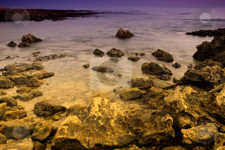 To use this stock image in your creative project, please select the size you need over to the right and click the "Add to Cart" button.
Your downloaded image will come with the Cutcaster watermark removed so don’t worry about the watermark you see on this page. Ocean stock photo, Long Exposure of sea over rocks - dreamy feel by Rui Vale de Sousa