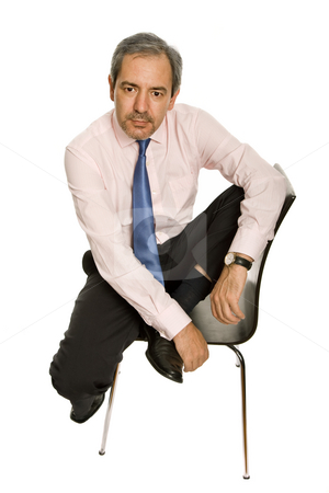 To use this stock image in your creative project, please select the size you need over to the right and click the "Add to Cart" button.
Your downloaded image will come with the Cutcaster watermark removed so don’t worry about the watermark you see on this page. Seated stock photo, Mature businessman on a chair, isolated on white by Rui Vale de Sousa