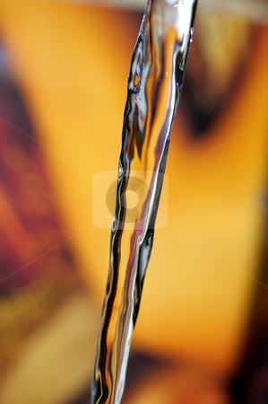 To use this stock image in your creative project, please select the size you need over to the right and click the "Add to Cart" button.
Your downloaded image will come with the Cutcaster watermark removed so don’t worry about the watermark you see on this page. Water stock photo, Water flow detail on a colored background by Rui Vale de Sousa