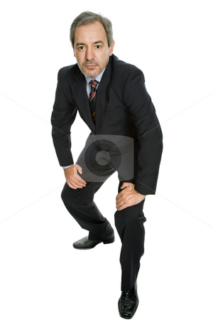To use this stock image in your creative project, please select the size you need over to the right and click the "Add to Cart" button.
Your downloaded image will come with the Cutcaster watermark removed so don’t worry about the watermark you see on this page. Standing stock photo, Mature business man isolated on white background by Rui Vale de Sousa
