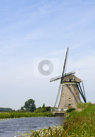 To use this stock image in your creative project, please select the size you need over to the right and click the "Add to Cart" button.
Your downloaded image will come with the Cutcaster watermark removed so don’t worry about the watermark you see on this page. Dutch Windmill stock photo, A typical Dutch Windmill, used for water management to keep the polders dry near Leidschendam, The Netherlands by Corepics VOF