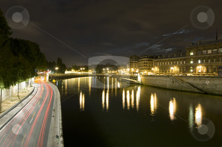 To use this stock image in your creative project, please select the size you need over to the right and click the "Add to Cart" button.
Your downloaded image will come with the Cutcaster watermark removed so don’t worry about the watermark you see on this page. Parisian Nights stock photo, A nightly view over the Seine with it's many bridges, and ring road, close to Ile de la Cite. The moon shines through a break in the clouds by Corepics VOF