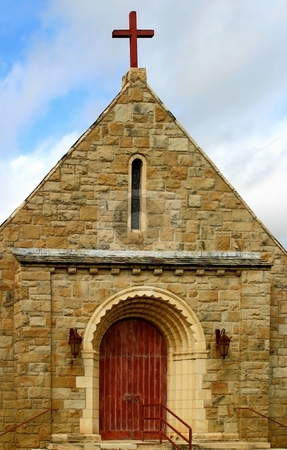 To use this stock image in your creative project, please select the size you need over to the right and click the "Add to Cart" button.
Your downloaded image will come with the Cutcaster watermark removed so don’t worry about the watermark you see on this page. Little Church stock photo, Front view of a little old stone chruch . by Henrik Lehnerer