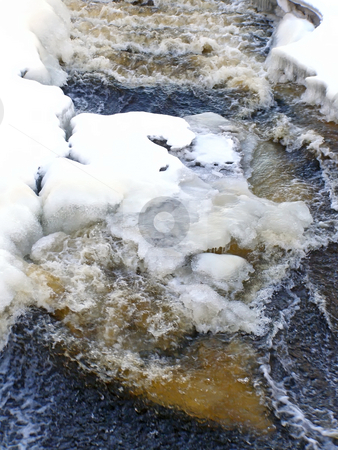 To use this stock image in your creative project, please select the size you need over to the right and click the "Add to Cart" button.
Your downloaded image will come with the Cutcaster watermark removed so don’t worry about the watermark you see on this page. Cold stream stock photo, Stream of water run through the snow and ice by Sergej Razvodovskij
