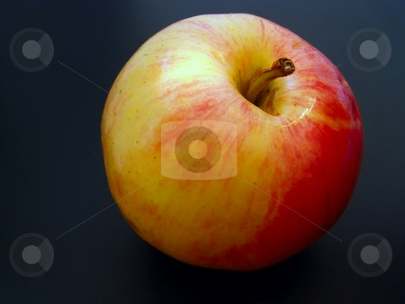 To use this stock image in your creative project, please select the size you need over to the right and click the "Add to Cart" button.
Your downloaded image will come with the Cutcaster watermark removed so don’t worry about the watermark you see on this page. Red apple stock photo, Red juicy apple against the black background by Sergej Razvodovskij