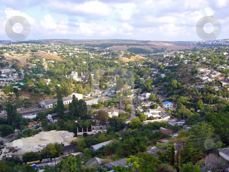 To use this stock image in your creative project, please select the size you need over to the right and click the "Add to Cart" button.
Your downloaded image will come with the Cutcaster watermark removed so don’t worry about the watermark you see on this page. Small town view stock photo, The small town view over the hill by Sergej Razvodovskij