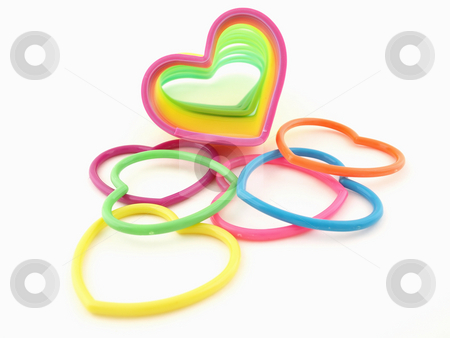 To use this stock image in your creative project, please select the size you need over to the right and click the "Add to Cart" button.
Your downloaded image will come with the Cutcaster watermark removed so don’t worry about the watermark you see on this page. Hearts and Slinky stock photo, Assortment of colorful hearts and a slinky isolated on a white background by Robert Gebbie