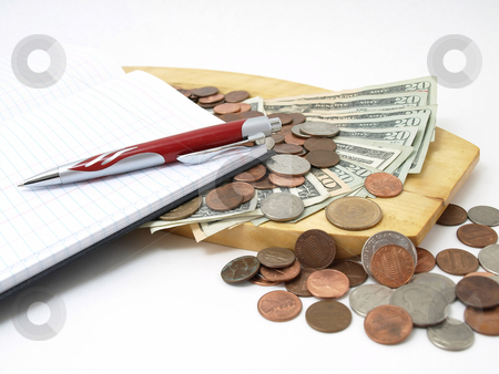 To use this stock image in your creative project, please select the size you need over to the right and click the "Add to Cart" button.
Your downloaded image will come with the Cutcaster watermark removed so don’t worry about the watermark you see on this page. Petty Cash stock photo, An open ledger and pen rest on a pile of loose United States coins and currency. by Robert Gebbie