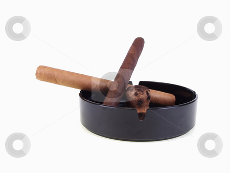 To use this stock image in your creative project, please select the size you need over to the right and click the "Add to Cart" button.
Your downloaded image will come with the Cutcaster watermark removed so don’t worry about the watermark you see on this page. Two Unlit Cigars with Ashtray stock photo, Two unlit cigars with a clean ashtray over a white background with room for text by Robert Gebbie