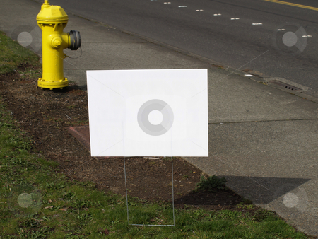 To use this stock image in your creative project, please select the size you need over to the right and click the "Add to Cart" button.
Your downloaded image will come with the Cutcaster watermark removed so don’t worry about the watermark you see on this page. Blank Road Sign stock photo, A blank white sign on the side of the road. by Robert Gebbie