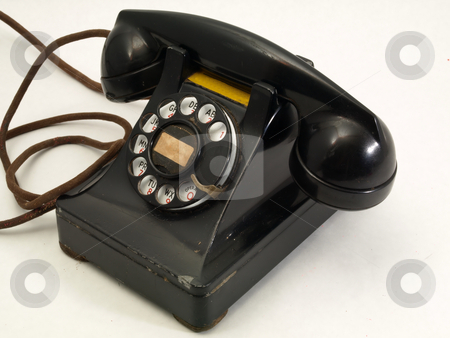 To use this stock image in your creative project, please select the size you need over to the right and click the "Add to Cart" button.
Your downloaded image will come with the Cutcaster watermark removed so don’t worry about the watermark you see on this page. Old Retro Telephone stock photo, An antique black rotary dial telephone isolated against a white background. by Robert Gebbie