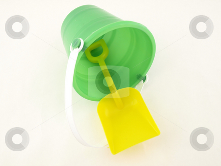 To use this stock image in your creative project, please select the size you need over to the right and click the "Add to Cart" button.
Your downloaded image will come with the Cutcaster watermark removed so don’t worry about the watermark you see on this page. Plastic Bucket and Shovel stock photo, A plastic bucket and shovel laying on its side isolated on a white background by Robert Gebbie