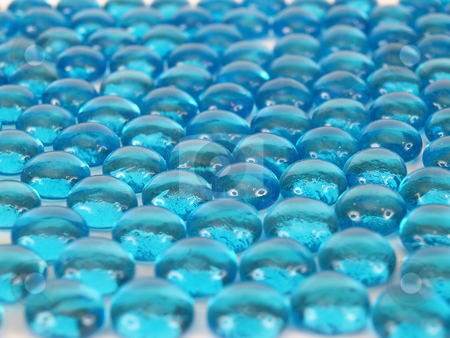 To use this stock image in your creative project, please select the size you need over to the right and click the "Add to Cart" button.
Your downloaded image will come with the Cutcaster watermark removed so don’t worry about the watermark you see on this page. Blue Audience stock photo, Blue glass beads taken in side shot, white highlights make eyes on faces. by Robert Gebbie