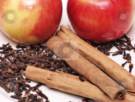 To use this stock image in your creative project, please select the size you need over to the right and click the "Add to Cart" button.
Your downloaded image will come with the Cutcaster watermark removed so don’t worry about the watermark you see on this page. Apples stock photo, Apples Cinnamon sticks and cloves set the theme for this photo. A good winter combination, good times happy warm memories. by Robert Gebbie