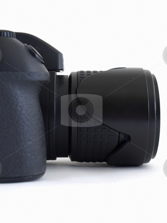 To use this stock image in your creative project, please select the size you need over to the right and click the "Add to Cart" button.
Your downloaded image will come with the Cutcaster watermark removed so don’t worry about the watermark you see on this page. Camera in Portrait stock photo, A black digital camera body with an attached lens. Studio isolated over white. by Robert Gebbie