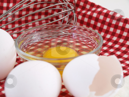 To use this stock image in your creative project, please select the size you need over to the right and click the "Add to Cart" button.
Your downloaded image will come with the Cutcaster watermark removed so don’t worry about the watermark you see on this page. Whisk and Eggs stock photo, An egg cracked into a dish, eggshells and whole eggs with a whisk laying on a red checkered background. by Robert Gebbie