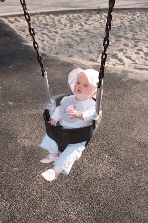 To use this stock image in your creative project, please select the size you need over to the right and click the "Add to Cart" button.
Your downloaded image will come with the Cutcaster watermark removed so don’t worry about the watermark you see on this page. Swing stock photo, Cute little caucasian baby girl having fun on a swing by Mariusz Jurgielewicz