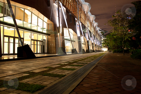 To use this stock image in your creative project, please select the size you need over to the right and click the "Add to Cart" button.
Your downloaded image will come with the Cutcaster watermark removed so don’t worry about the watermark you see on this page. Walk In Park At Night stock photo, A view of wide, well lit street or walkway through a park at night by Hieng Ling Tie