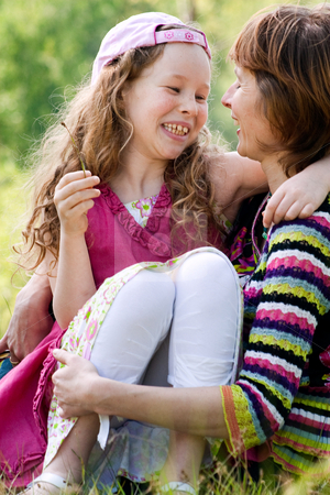 To use this stock image in your creative project, please select the size you need over to the right and click the "Add to Cart" button.
Your downloaded image will come with the Cutcaster watermark removed so don’t worry about the watermark you see on this page. Happy childhood stock photo, Mother and daughter have a happy time together by Frenk and Danielle Kaufmann