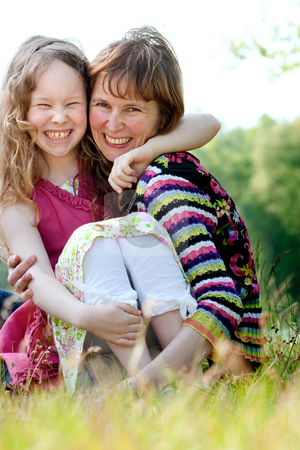 To use this stock image in your creative project, please select the size you need over to the right and click the "Add to Cart" button.
Your downloaded image will come with the Cutcaster watermark removed so don’t worry about the watermark you see on this page. Happyness mother and daugther stock photo, Mother and daughter have a happy time together by Frenk and Danielle Kaufmann